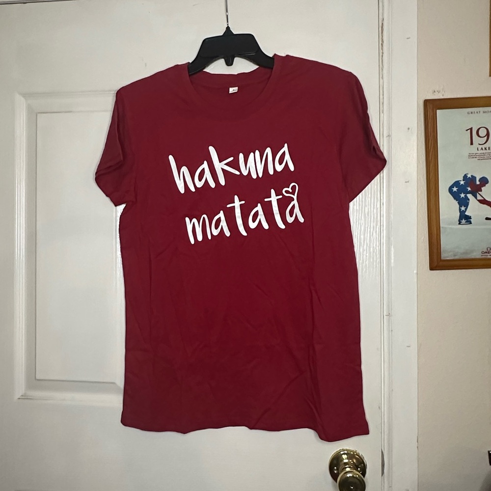 Disney lion King Hakuna Matata shirts, one black one burgundy!